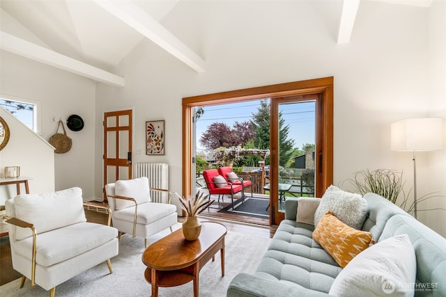 living room featuring radiator, beamed ceiling, high vaulted ceiling, and wood finished floors