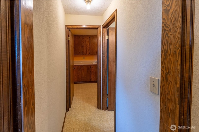 corridor with a textured wall