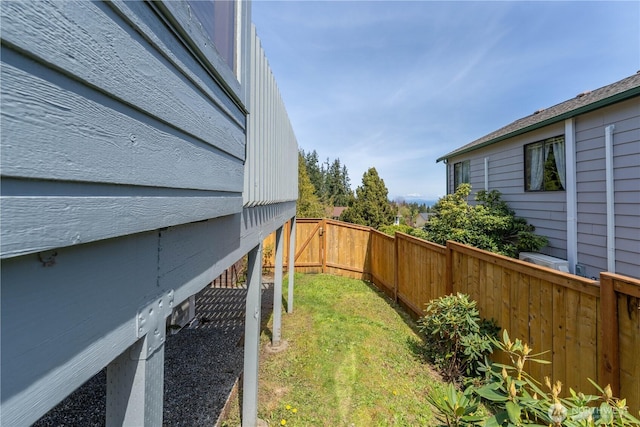 view of yard with a fenced backyard