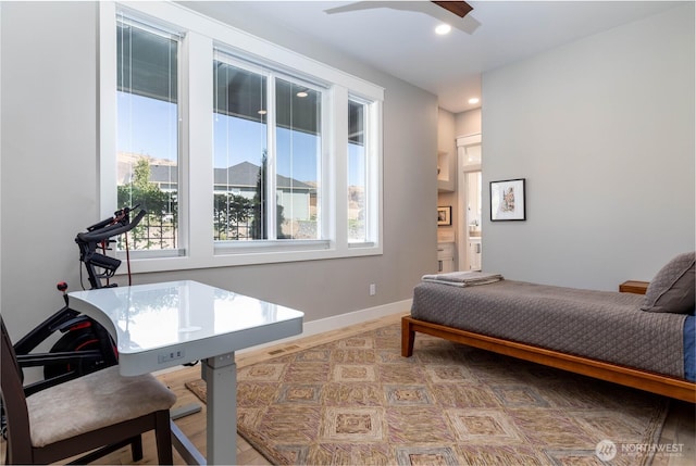bedroom featuring connected bathroom, recessed lighting, baseboards, wood finished floors, and visible vents