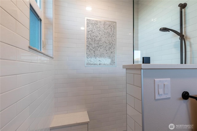 bathroom with a walk in shower