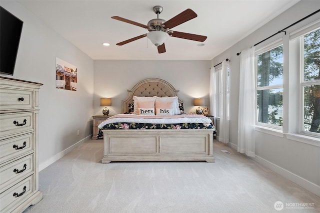 bedroom with baseboards, light carpet, a ceiling fan, and recessed lighting
