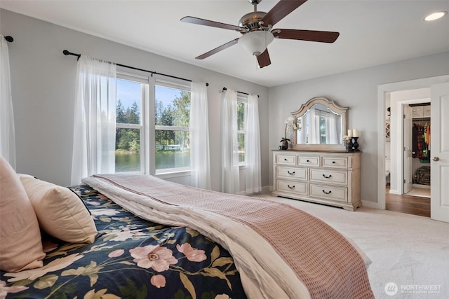 bedroom featuring baseboards, a ceiling fan, recessed lighting, and light colored carpet