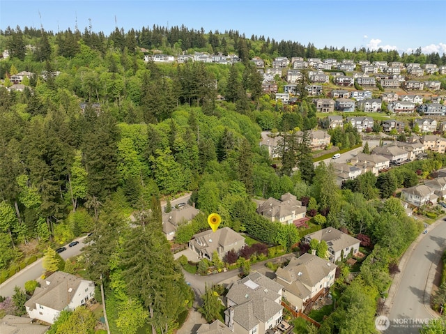16653 SE 69th Way, Bellevue, WA 98006 - aerial overview of property's location featuring nearby suburban area and a heavily wooded area