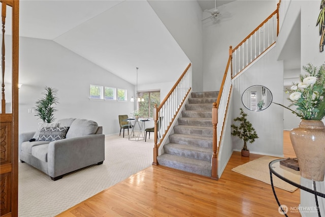 710 122nd Avenue Ct E, Edgewood, WA 98372 - stairway with a ceiling fan, baseboards, and wood finished floors