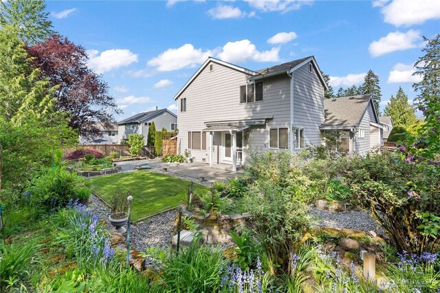 710 122nd Avenue Ct E, Edgewood, WA 98372 - rear view of house with a yard, a patio area, fence, and a pergola