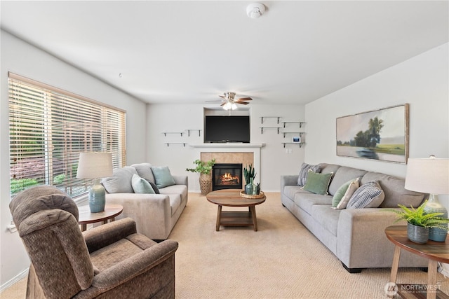 710 122nd Avenue Ct E, Edgewood, WA 98372 - living room featuring a ceiling fan, baseboards, light colored carpet, and a tiled fireplace