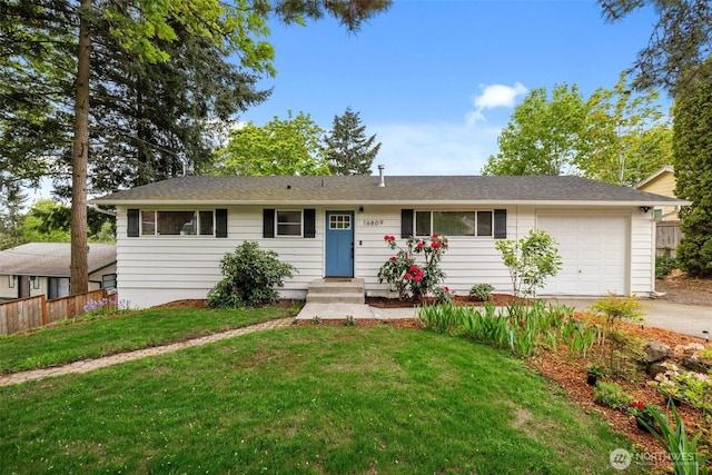 ranch-style home with a garage, concrete driveway, fence, a front yard, and entry steps
