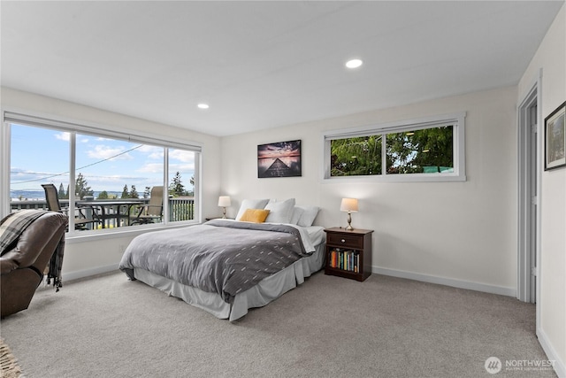 bedroom with baseboards, recessed lighting, and carpet