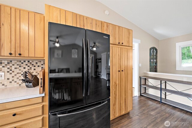 15304 SE 296th St, Kent, WA 98042 - kitchen featuring decorative backsplash, dark wood-style flooring, light countertops, freestanding refrigerator, and lofted ceiling