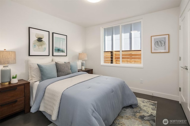 7356 21st Ave NW, Seattle, WA 98117 - bedroom featuring baseboards