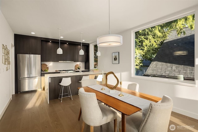 7356 21st Ave NW, Seattle, WA 98117 - dining area featuring baseboards, recessed lighting, and wood finished floors