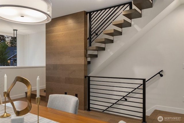 7356 21st Ave NW, Seattle, WA 98117 - staircase featuring baseboards