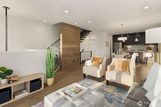 7356 21st Ave NW, Seattle, WA 98117 - living area featuring recessed lighting, wood finished floors, and stairway
