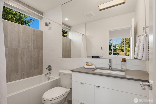 7356 21st Ave NW, Seattle, WA 98117 - bathroom with toilet, shower / bath combination with curtain, a wealth of natural light, and vanity