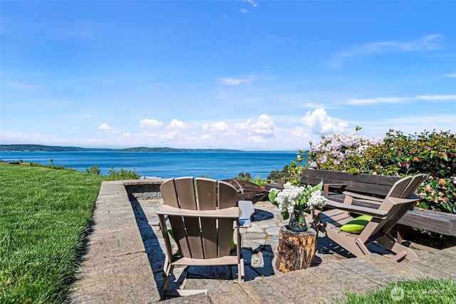 view of water feature featuring an outdoor fire pit