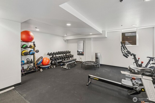 workout area with recessed lighting
