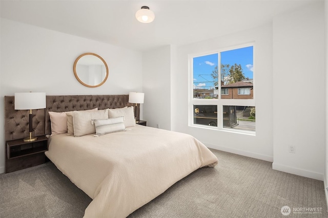 8018 24th Ave NW, Seattle, WA 98117 - carpeted bedroom featuring baseboards