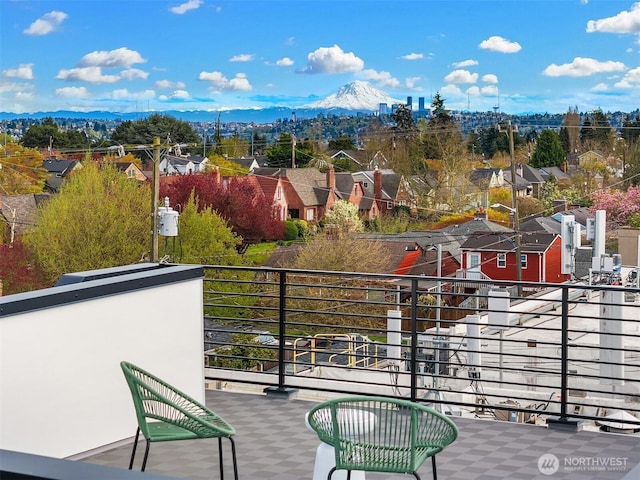 8018 24th Ave NW, Seattle, WA 98117 - wooden terrace featuring a mountain view and a residential view
