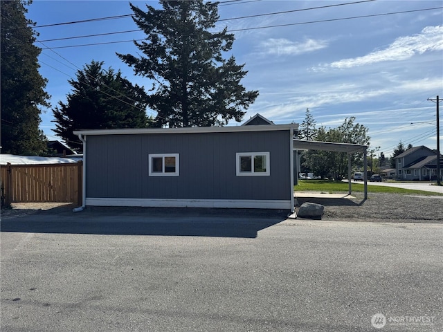 garage with fence