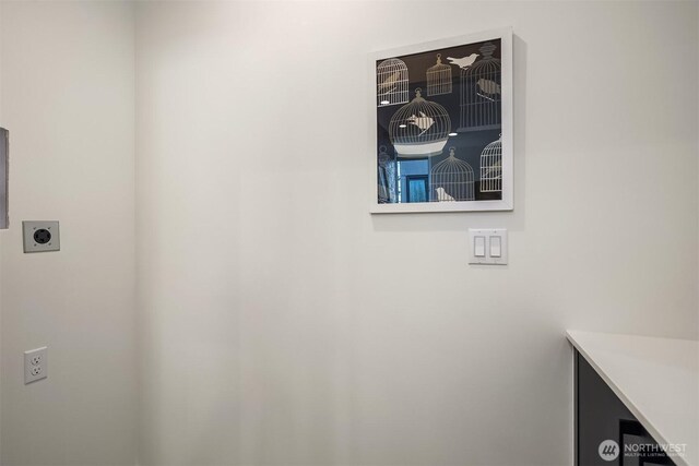 clothes washing area with laundry area and hookup for an electric dryer