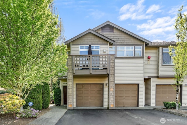 17610 134th Ln SE, Renton, WA 98058 - view of property featuring a garage, driveway, and a balcony