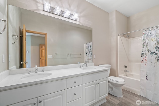 17610 134th Ln SE, Renton, WA 98058 - full bath featuring a sink, double vanity, shower / bath combo, and wood finished floors