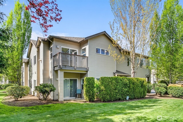 17610 134th Ln SE, Renton, WA 98058 - back of house with a lawn and a balcony