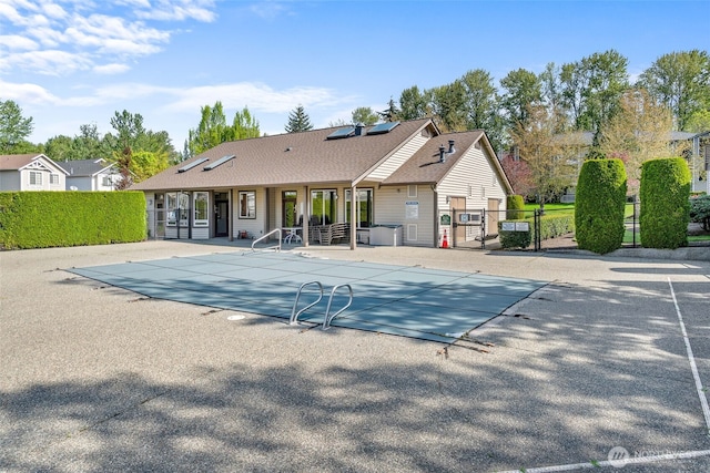 17610 134th Ln SE, Renton, WA 98058 - view of swimming pool with a gate, a patio area, and fence