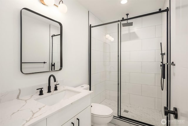 8018 24th Ave NW Unit B, Seattle, WA 98117 - bathroom with vanity, toilet, and a shower stall