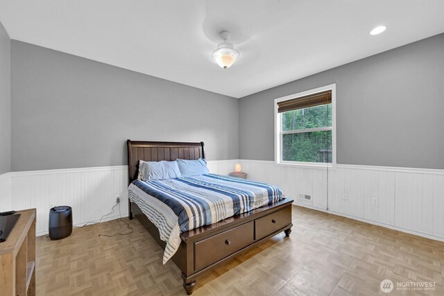 17132 156th Ln SE, Yelm, WA 98597 - bedroom featuring visible vents and a wainscoted wall