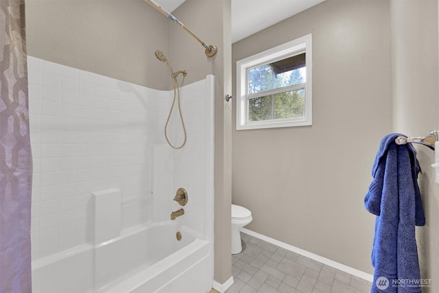 17132 156th Ln SE, Yelm, WA 98597 - bathroom featuring toilet, baseboards, and shower / tub combo with curtain