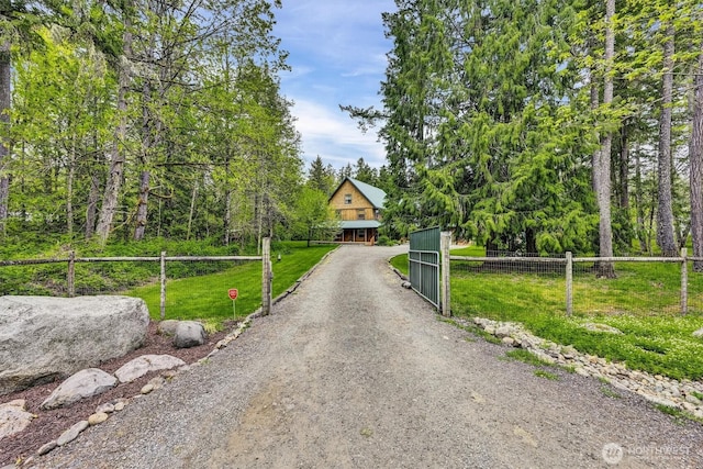 17132 156th Ln SE, Yelm, WA 98597 - view of street featuring dirt driveway and a gated entry