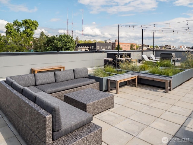 121 12th Ave E Unit 506, Seattle, WA 98102 - view of patio / terrace with an outdoor living space