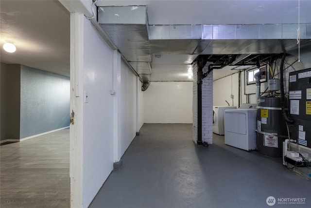 basement with secured water heater, heating unit, and independent washer and dryer
