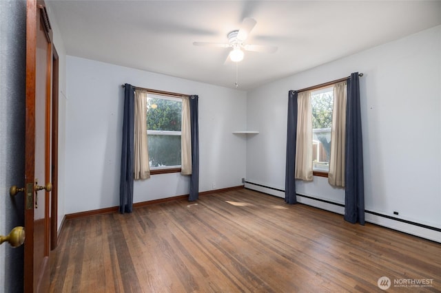empty room with baseboards, a ceiling fan, wood finished floors, and a healthy amount of sunlight