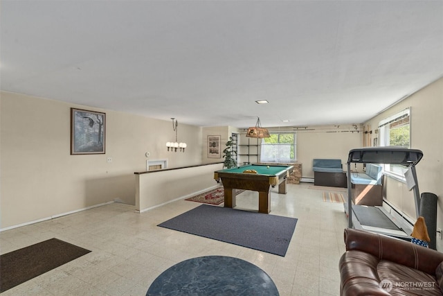 rec room featuring healthy amount of natural light, tile patterned floors, and baseboards