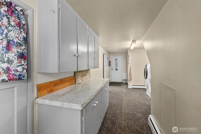 hallway with a baseboard radiator and baseboard heating