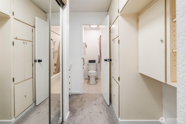 12621 NE 130th Way # D106, Kirkland, WA 98034 - full bathroom with toilet, tile patterned floors, and shower / bathing tub combination
