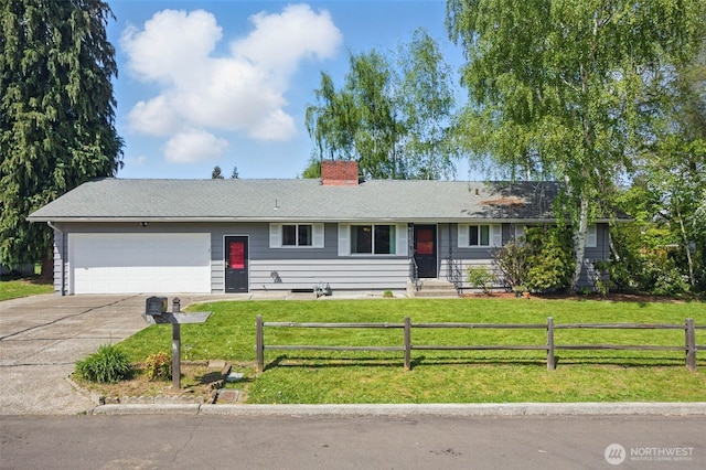 ranch-style home featuring fence, a front yard, a chimney, concrete driveway, and an attached garage