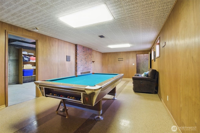 recreation room featuring wooden walls, baseboards, and billiards