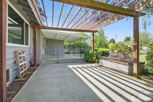 view of patio / terrace with fence and a pergola