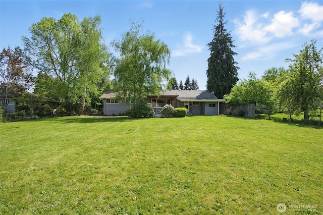 view of yard featuring fence
