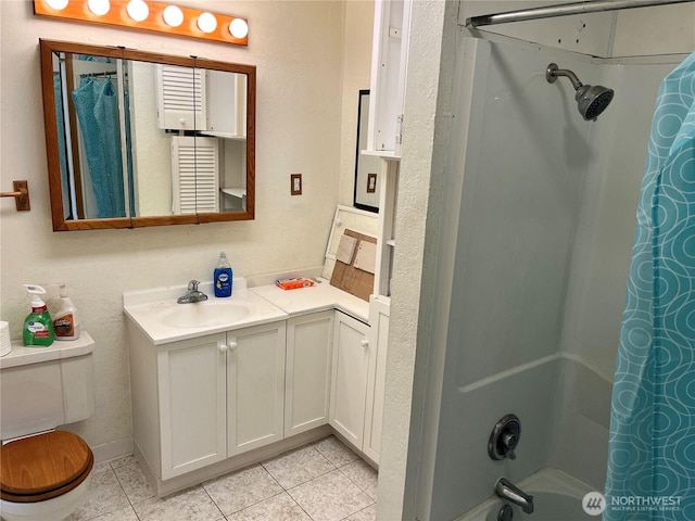 full bathroom featuring vanity, tile patterned flooring, toilet, and shower / bath combination with curtain