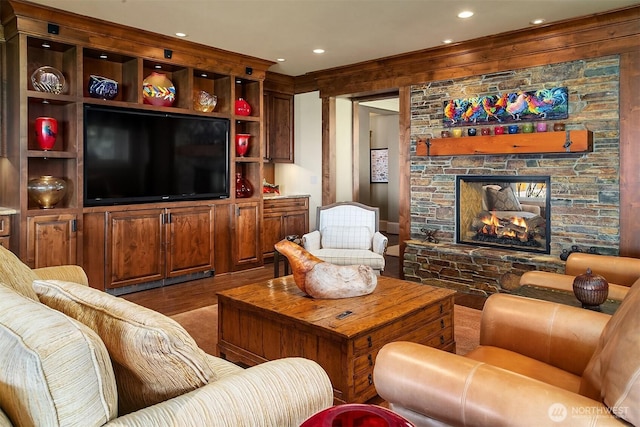 5844 Mutiny Bay Rd, Freeland, WA 98249 - living room featuring recessed lighting, a stone fireplace, and wood finished floors