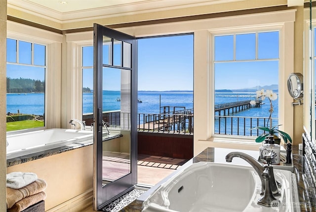 5844 Mutiny Bay Rd, Freeland, WA 98249 - sunroom / solarium featuring a water view and a sink