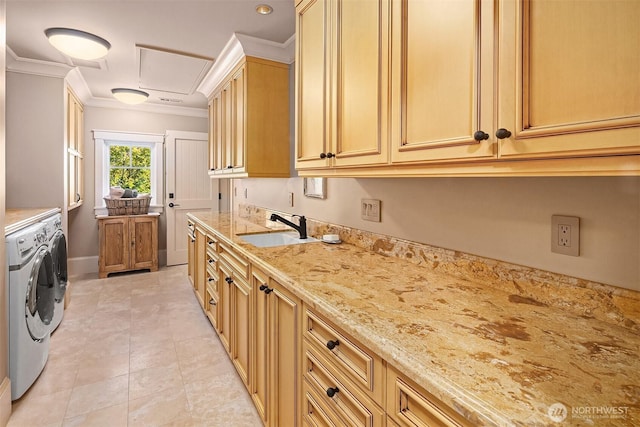 5844 Mutiny Bay Rd, Freeland, WA 98249 - washroom featuring crown molding, cabinet space, a sink, light tile patterned floors, and washer and clothes dryer