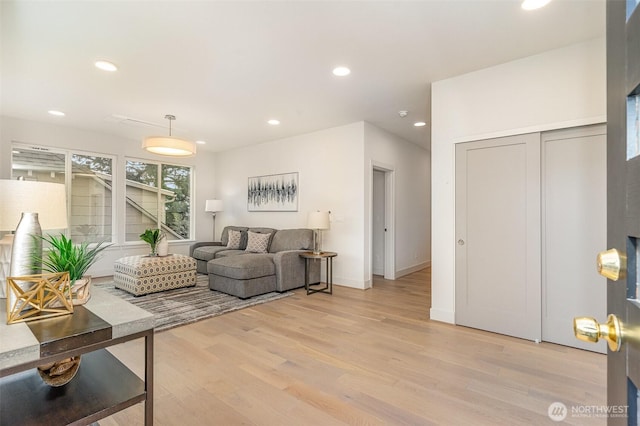 4019B 4th Ave NE, Seattle, WA 98105 - living room with recessed lighting, baseboards, and light wood-type flooring