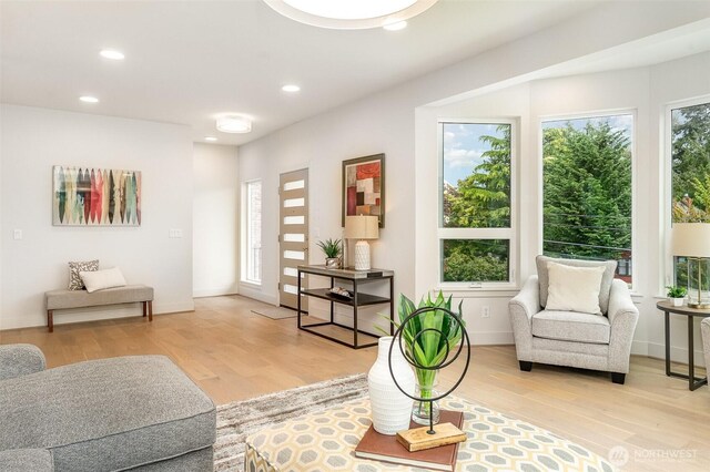 4019B 4th Ave NE, Seattle, WA 98105 - living area featuring baseboards, recessed lighting, and light wood-style flooring