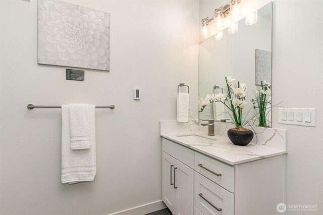 4019B 4th Ave NE, Seattle, WA 98105 - bathroom with vanity and baseboards
